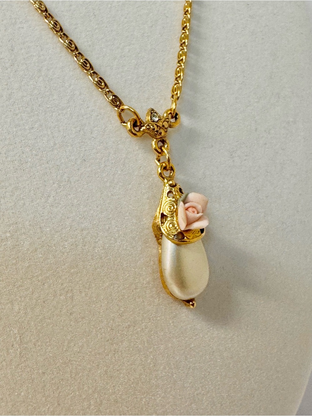 Vintage 1928 Gold Tone Pearl Drop Necklace with Pink Rose Accent